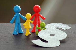 Foto: Symbol Familie und Paragrafenzeichen